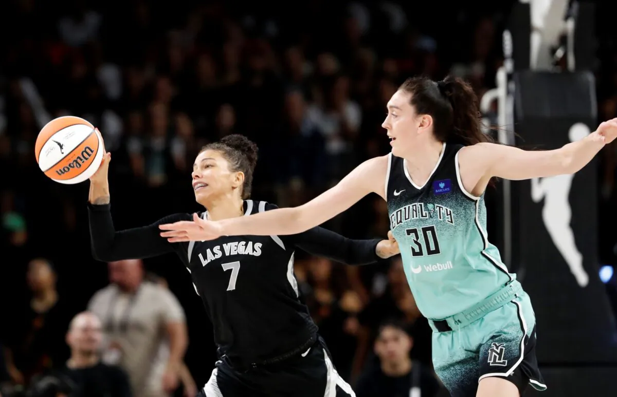 Breanna Stewart (R) of the New York Liberty pursues the basketball against the Las Vegas Aces during WNBA action in Las Vegas on Aug. 17, 2024. (Steve Marcus/Las Vegas Sun via AP)