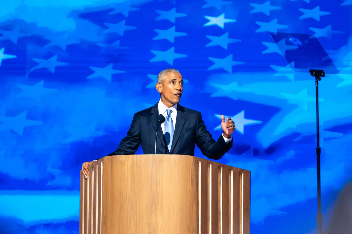 Former President Barack Obama speaks during the second day of the Democratic National Convention (DNC) at the United Center in Chicago on Aug. 20, 2024. (Madalina Vasiliu/The Epoch Times)