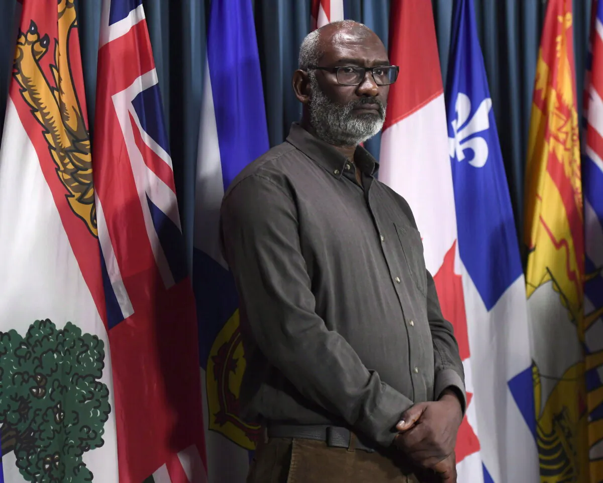 Abousfian Abdelrazik, a Canadian citizen who was detained in Sudan, looks on during a press conference on developments in his civil court case against the federal government, on Parliament Hill in Ottawa on Sept. 14, 2018. (The Canadian Press/Justin Tang)