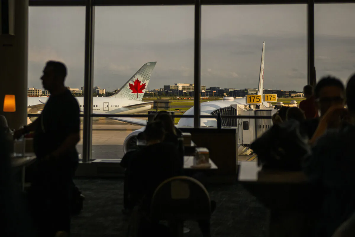 An Air Canada Plane is seen at Pearson Airport in Toronto, on July 24, 2024. (The Canadian Press/Christopher Katsarov)