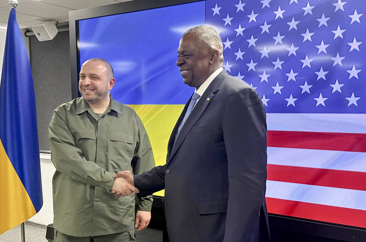 Ukrainian Defense Minister Rustem Umerov (L) greets United States Secretary of Defense Lloyd Austin prior to their talks in Kyiv, Ukraine, on Nov. 20, 2023. (W.G. Dunlop/Pool/AFP via Getty Images)