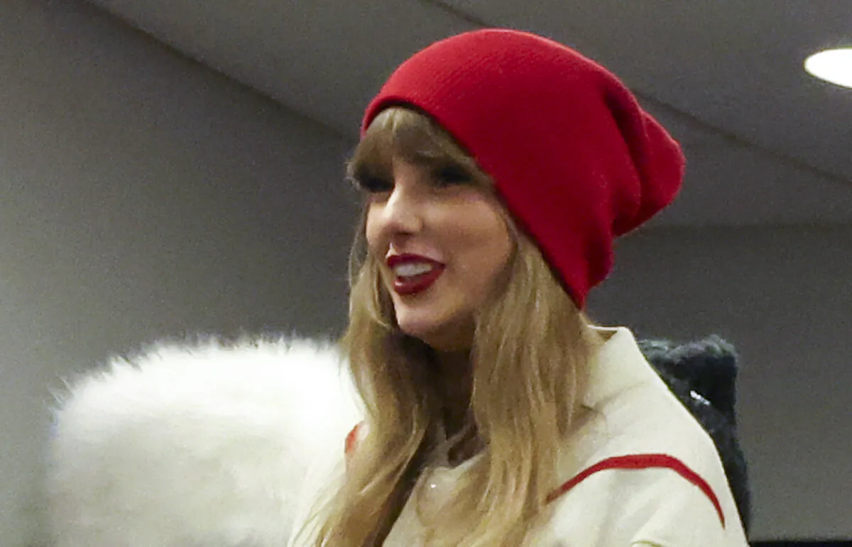 Taylor Swift watches the second quarter in the AFC Divisional Playoff game between the Kansas City Chiefs and the Buffalo Bills at Highmark Stadium in Orchard Park, N.Y., on Jan. 21, 2024. (Al Bello/Getty Images)