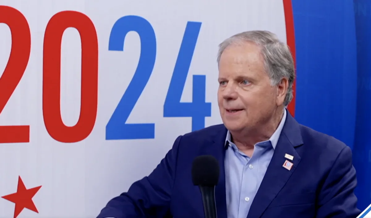 Former Alabama Sen. Doug Jones Speaks with NTD’s Kelly Wright at the DNC in Chicago on Aug. 22, 2024, in a still from video. (NTD)