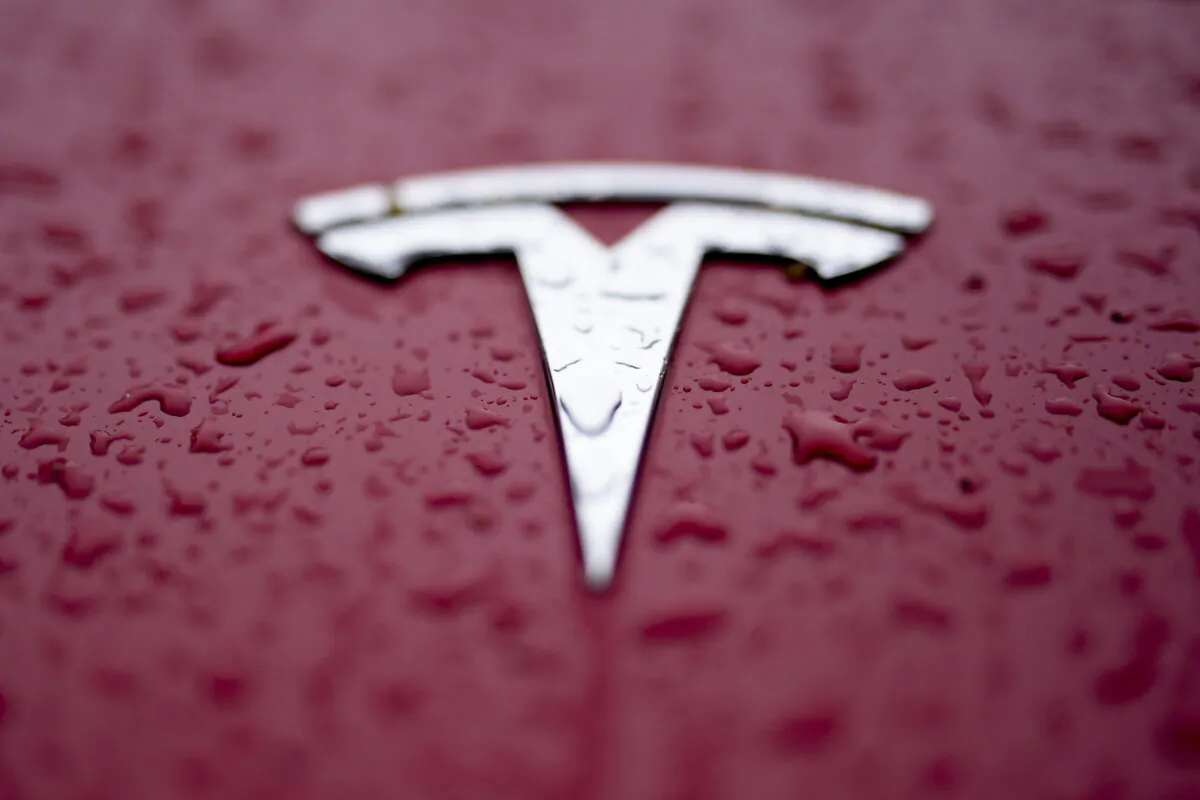 A Tesla logo is shown on Feb. 27, 2024, in Charlotte, N.C. (AP Photo/Chris Carlson)