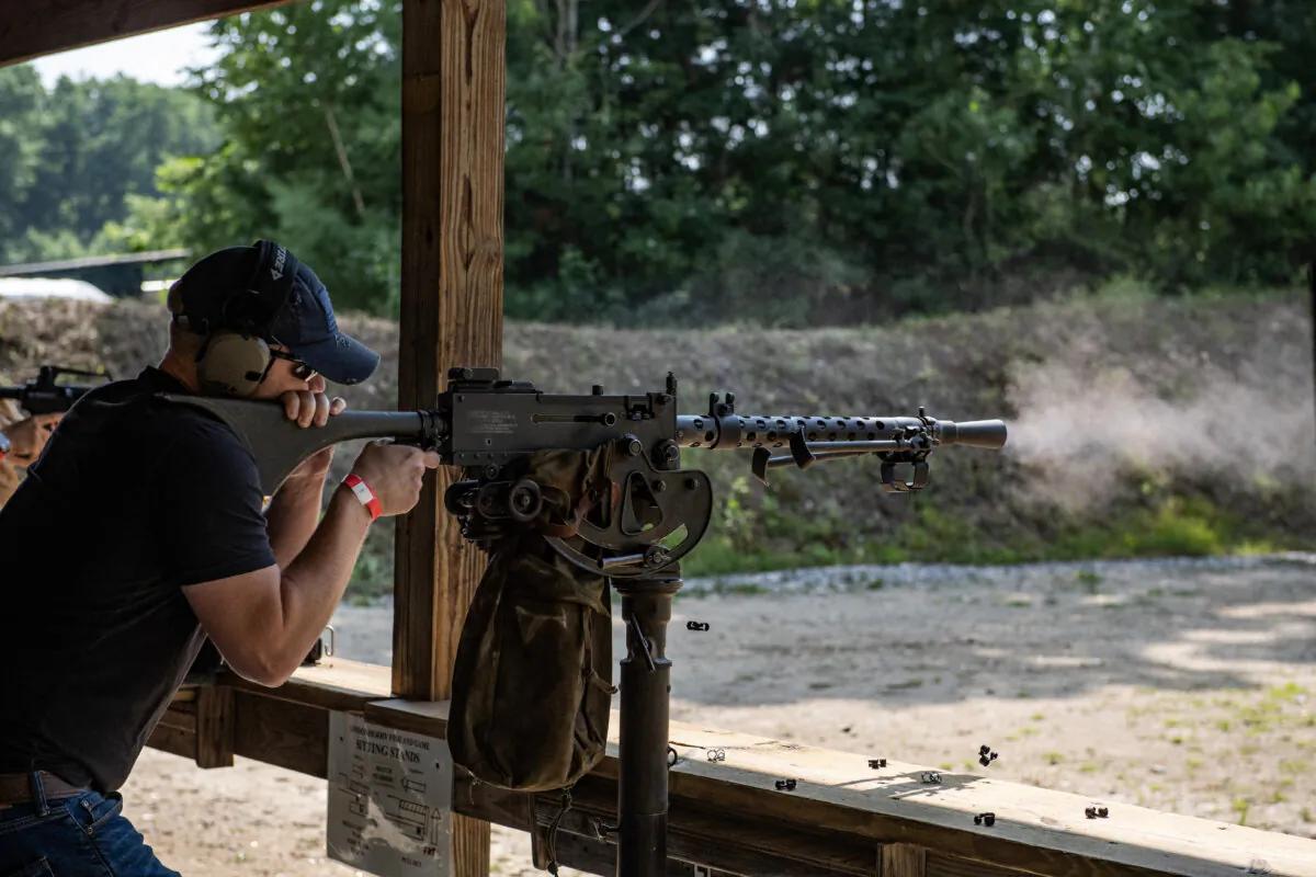 A man fires a machine gun in New Hampshire in an undated file photograph. (Joseph Prezioso/AFP via Getty Images)