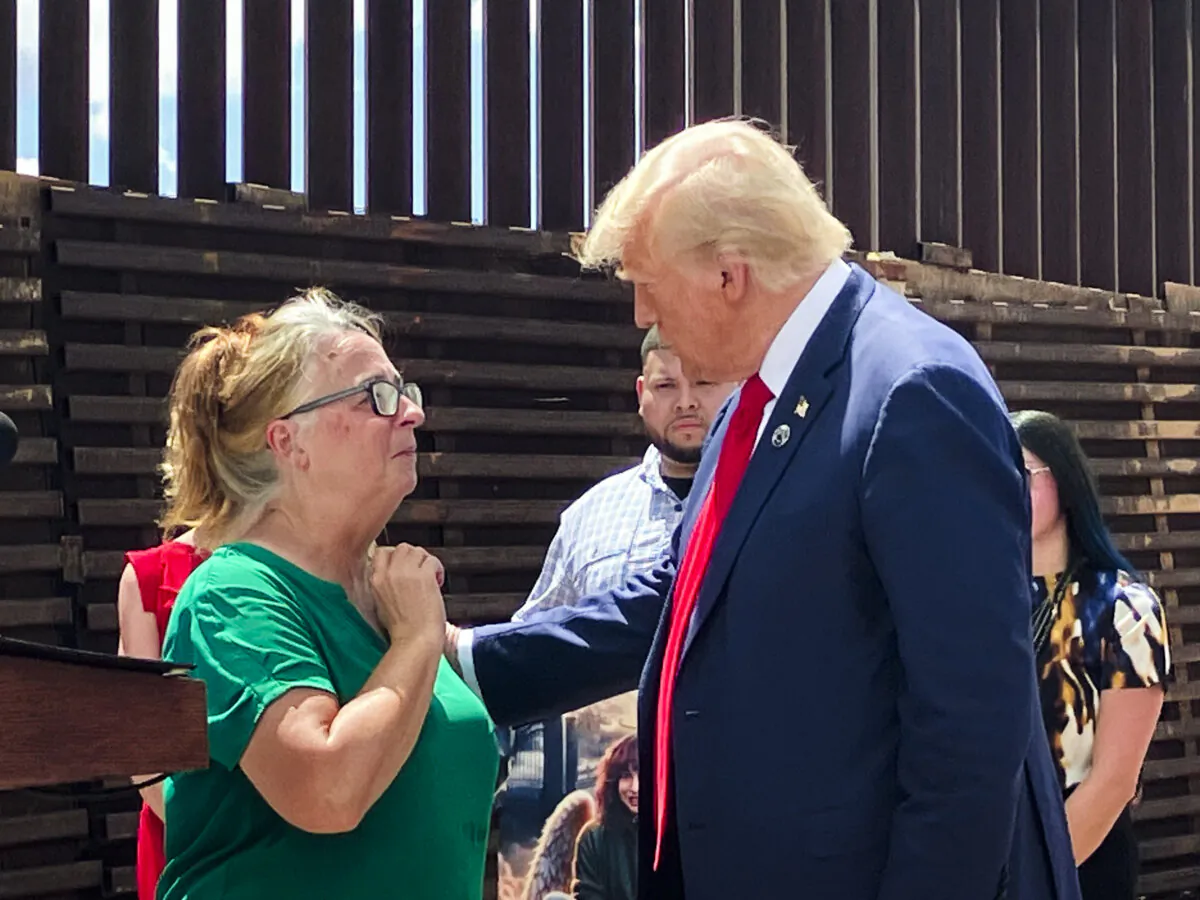 Former President Donald Trump (R) with Patty Morin (L) during a visit to the border wall at Montezuma Pass, Cochise County, Ariz., on Aug. 22, 2024. (Janice Hisle/The Epoch Times)