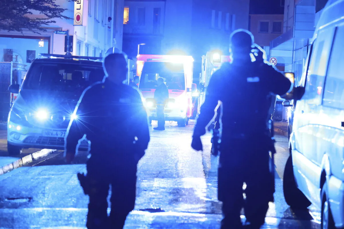 Police and ambulances near the scene where people were killed and injured in an attack at a festival in Solingen, western Germany, on Aug. 23, 2024. (Gianni Gattus/dpa via AP)