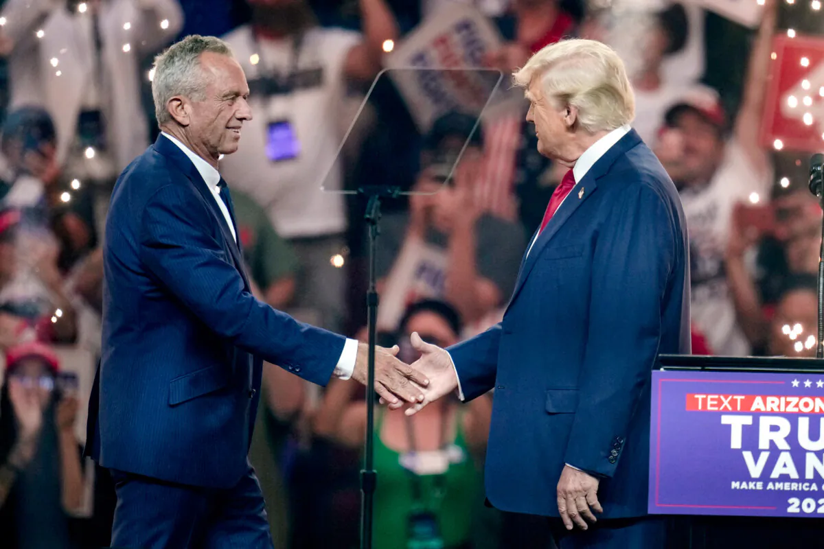 Independent presidential candidate Robert F. Kennedy Jr. (L) shakes hands with Republican presidential nominee former President Donald Trump at a campaign rally in Glendale, Ariz., on Aug. 23, 2024. (Ross D. Franklin/AP Photo)