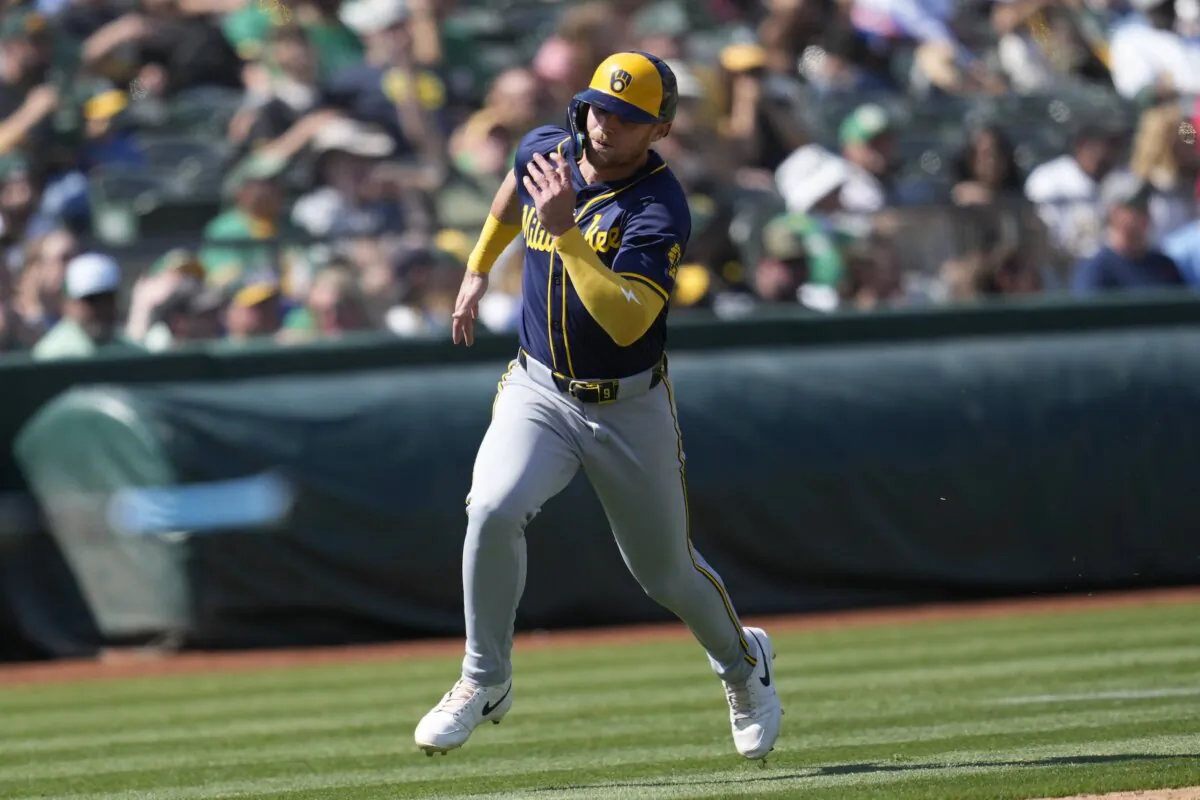 Milwaukee Brewers' Jake Bauers runs home to score against the Oakland Athletics during the eighth inning of a baseball game in Oakland, Calif., on Aug. 24, 2024. (Jeff Chiu/AP Photo)