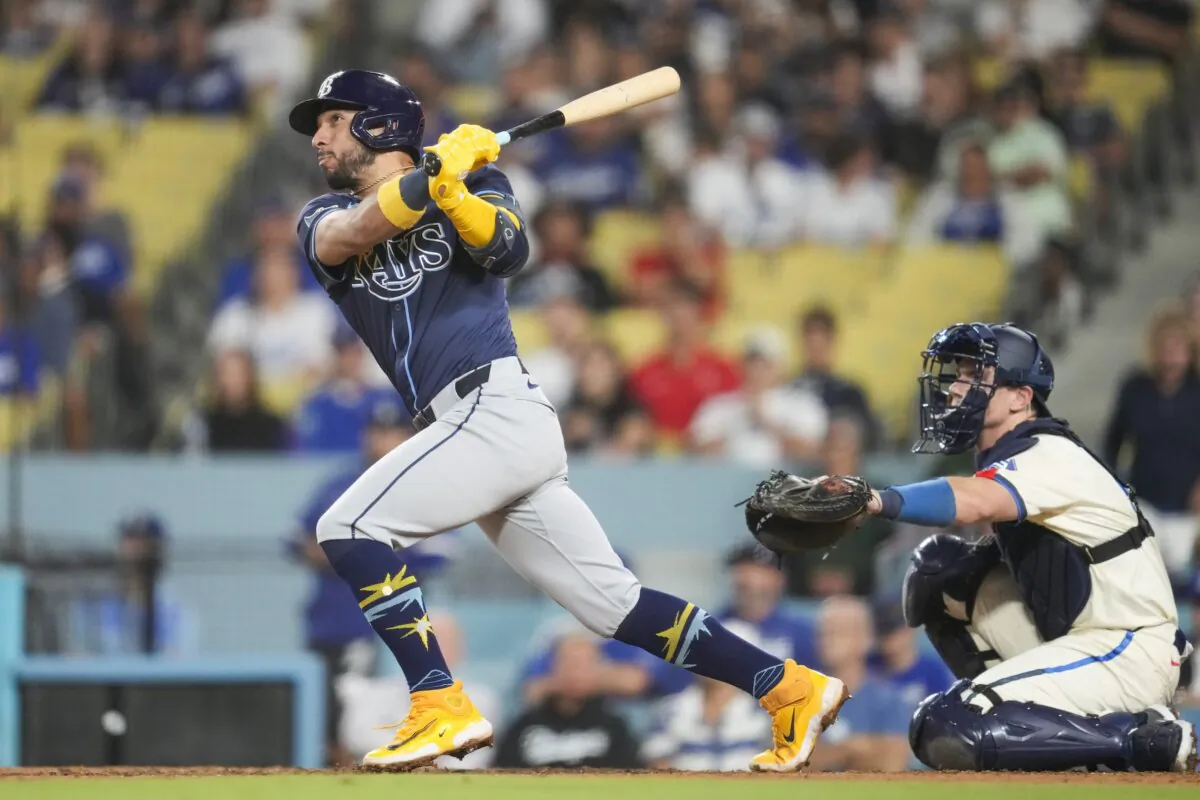 Tampa Bay Rays' José Caballero hits a home run during the tenth inning of a baseball game against the Los Angeles Dodgers in Los Angeles on Aug. 24, 2024. (Ashley Landis/AP Photo)