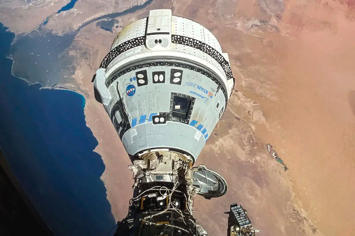 The Starliner spacecraft docked to the Harmony module of the International Space Station, orbiting 262 miles above Egypt's Mediterranean coast, on June 13, 2024. (NASA via AP)