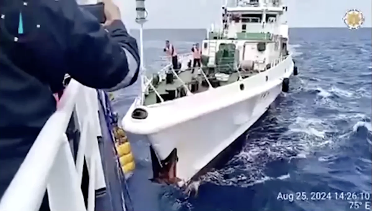 The moment of a collision between coast guard vessels from China and the Philippines in the South China Sea on Aug. 25, 2024. (National Task Force for the West Philippine Sea via Reuters/Screenshot via The Epoch Times)