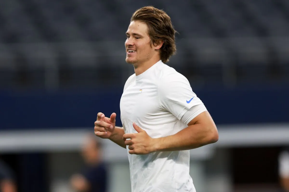 Los Angeles Chargers quarterback Justin Herbert warms up before a preseason game against the Dallas Cowboys in Arlington, Texas, on Aug. 24, 2024. (Gareth Patterson/AP Photo)
