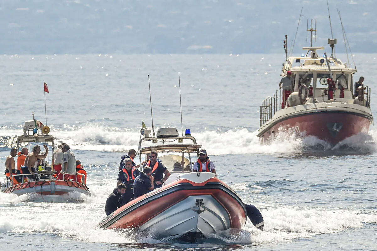 Italian firefighter divers work at the site of a shipwreck, in Porticello, Sicily, southern Italy, on Aug. 22, 2024. (Salvatore Cavalli/AP Photo)