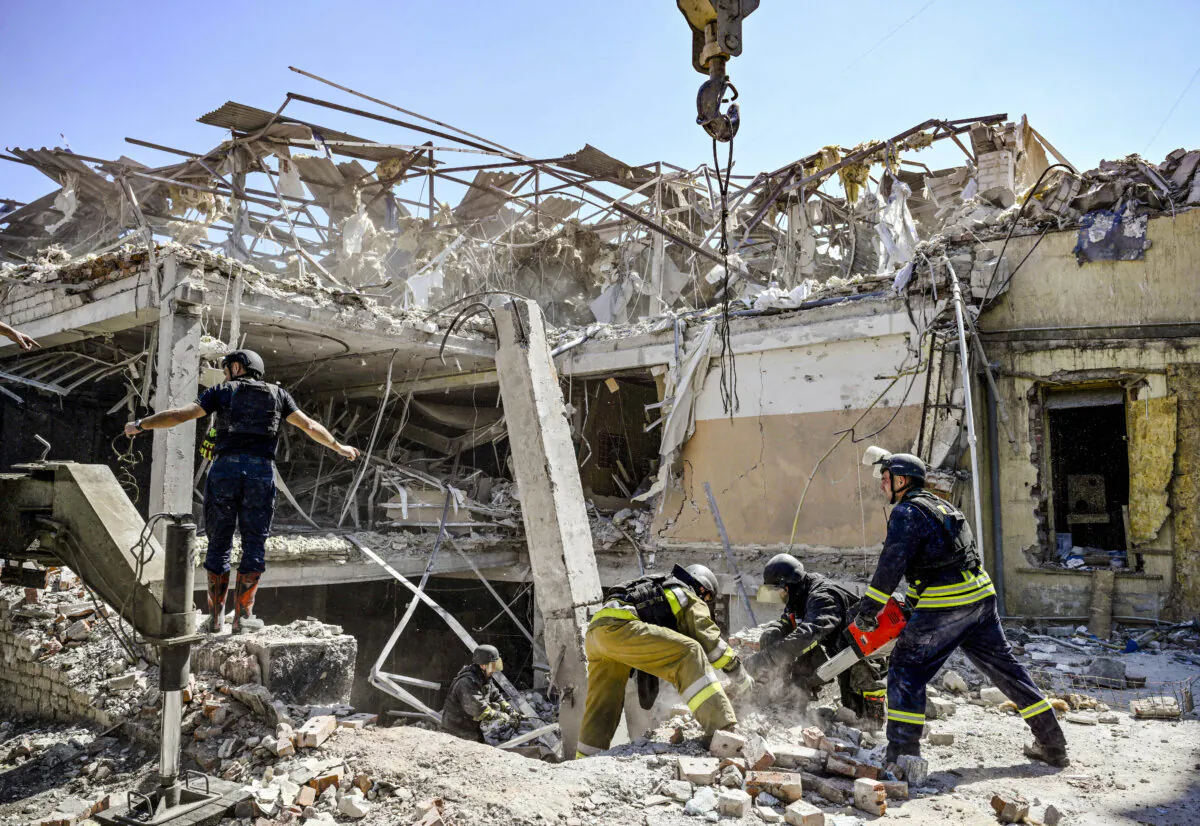 Ukrainian emergency services carry out a search and rescue operation among the rubble of a destroyed hotel after a strike in the town of Kramatorsk, in the Donetsk region of Ukraine on Aug. 25, 2024. (Genya Savilov/AFP via Getty Images)