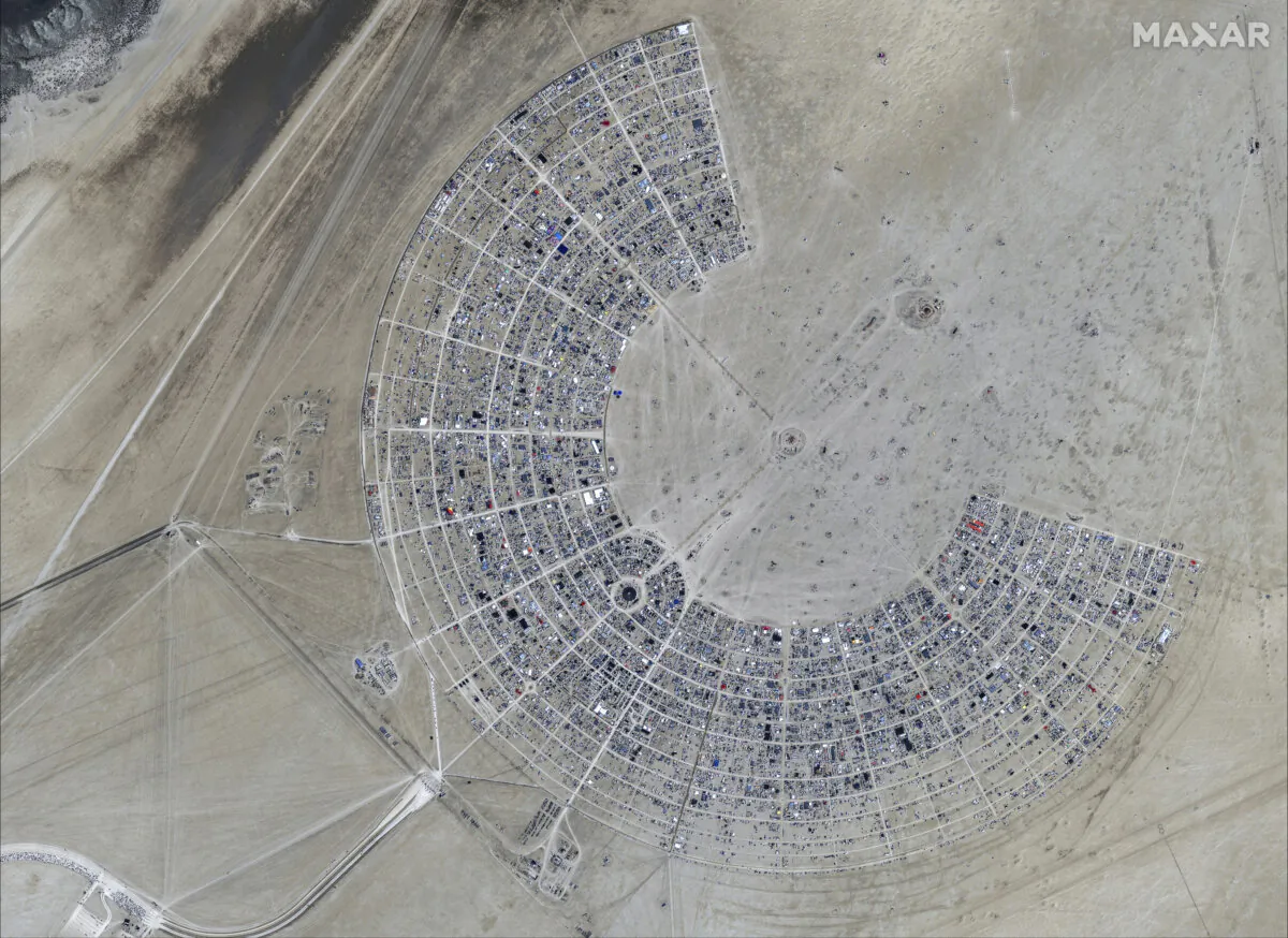 A satellite image shows an overview of the Burning Man 2024 festival in Black Rock City, Nev., on Aug. 25, 2024. (Satellite image ©2024 Maxar Technologies via AP)