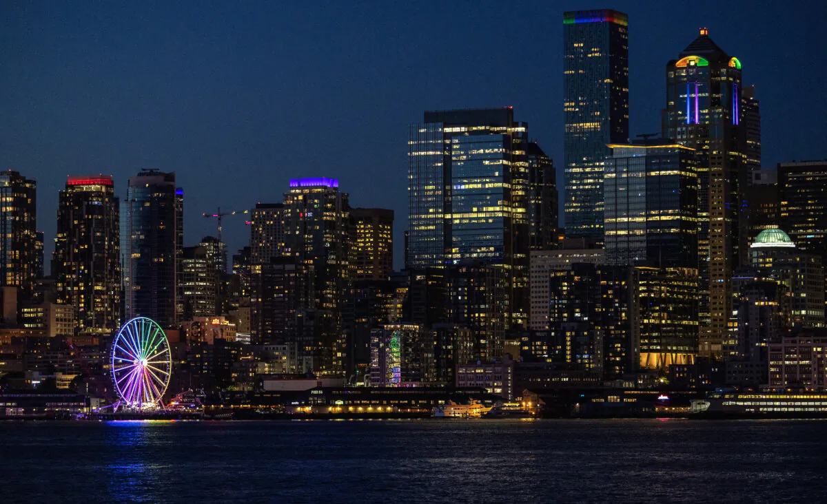 The Seattle Great Wheel shines brightly in the colors of the rainbow to mark the 50th anniversary of Seattle Pride on Thursday, May 30, 2024. (Nick Wagner/The Seattle Times/TNS)