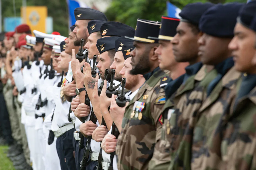 French armed forces attend a ceremony for the national holiday Bastille Day at the war memorial on Place Bir Hakeim in the capital of the French Pacific territory of New Caledonia, in Noumea, on July 14, 2024. (Photo by Delphine MAYEUR / AFP) (Photo by DELPHINE MAYEUR/AFP via Getty Images)