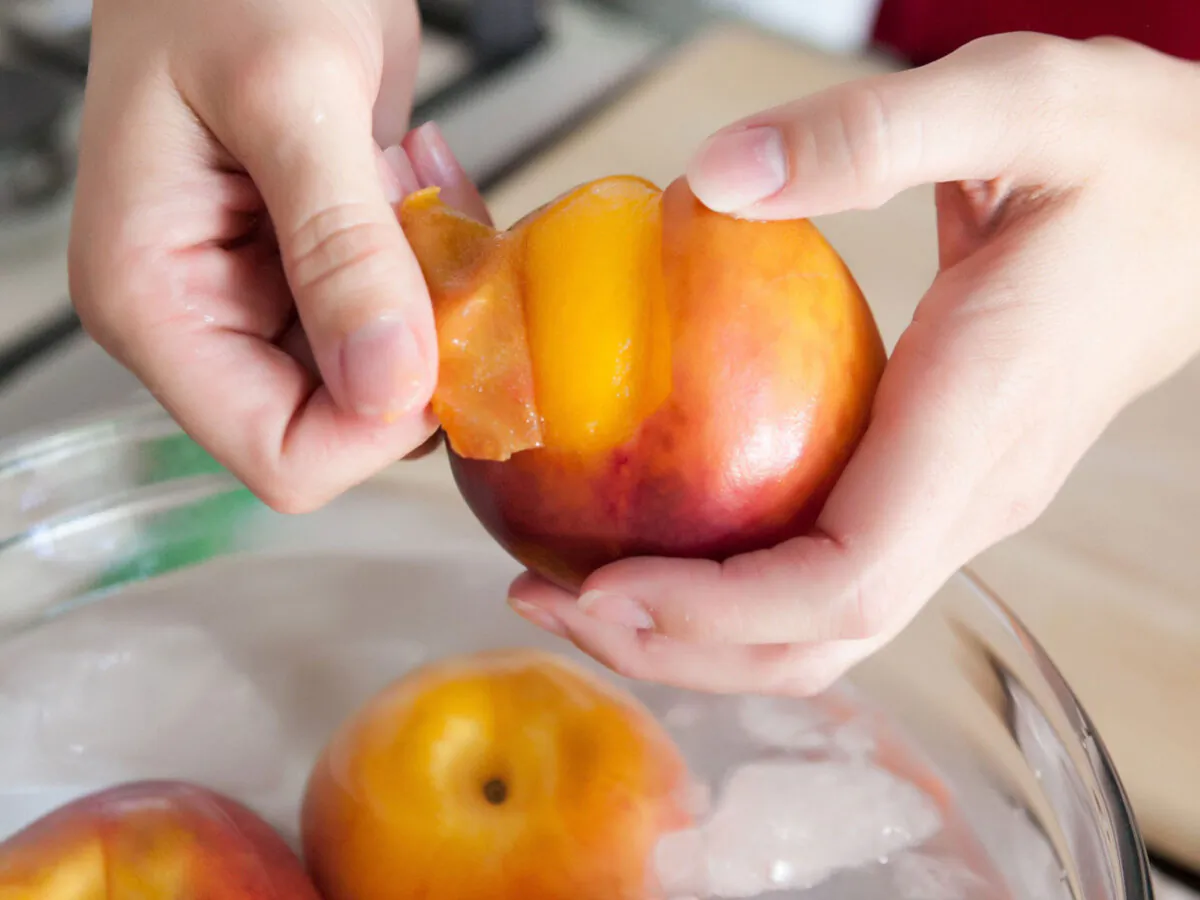 If you don’t want to fuss with a paring knife, there’s an easier way to peel peaches. ( Erika Tracy/TNS)