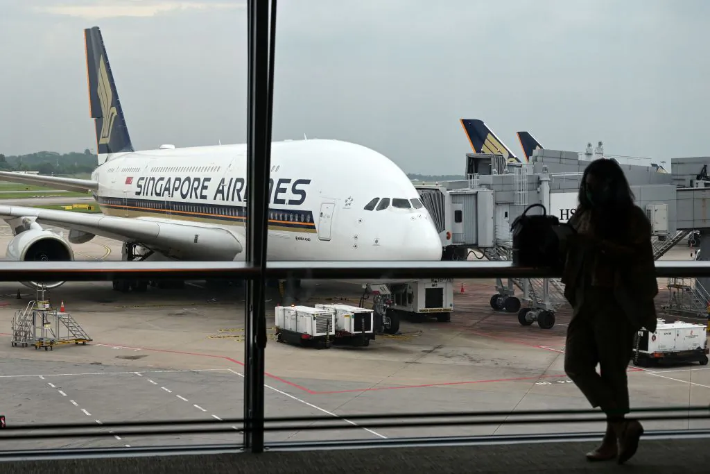A Singapore Airlines Airbus A380 plane is seen parked on the tarmac at Singapore Changi Airport in Singapore on Oct. 24, 2020. (ROSLAN RAHMAN/AFP via Getty Images)