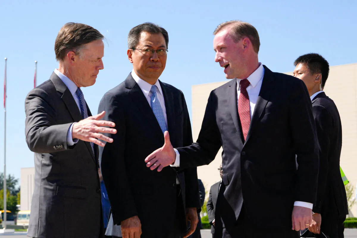 U.S. national security adviser Jake Sullivan is welcomed by Director General of the Department of North American and Oceanian Affairs of the Foreign Ministry Yang Tao (C) and U.S. Ambassador to China Nicholas Burns (L) upon arriving at the Beijing Capital International Airport in China on Aug. 27, 2024. (Ng Han Guan/Pool/AFP via Getty Images)