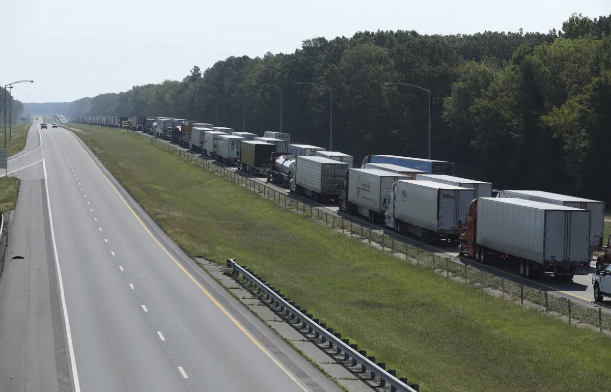 Eastbound traffic is backed up on I-40 near the Hazen, Ark., exit after an accident involving hazardous materials led to multiple road closures and evacuations in the area on Aug. 27, 2024. (Colin Murphey/Arkansas Democrat-Gazette via AP) 