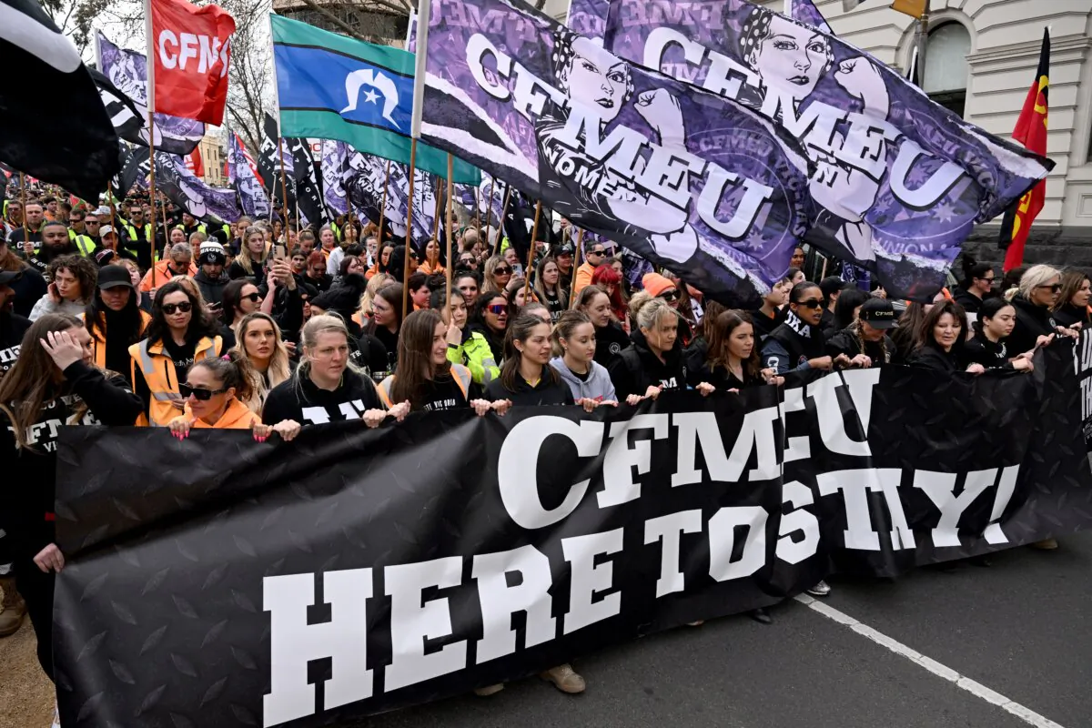 Tens of thousands of workers march after walking off work sites in protest against the forced administration of the construction arm of the Construction, Forestry, Mining and Energy Union (CFMEU), in Melbourne, Australia on Aug. 27, 2024. (William West/AFP via Getty Images)