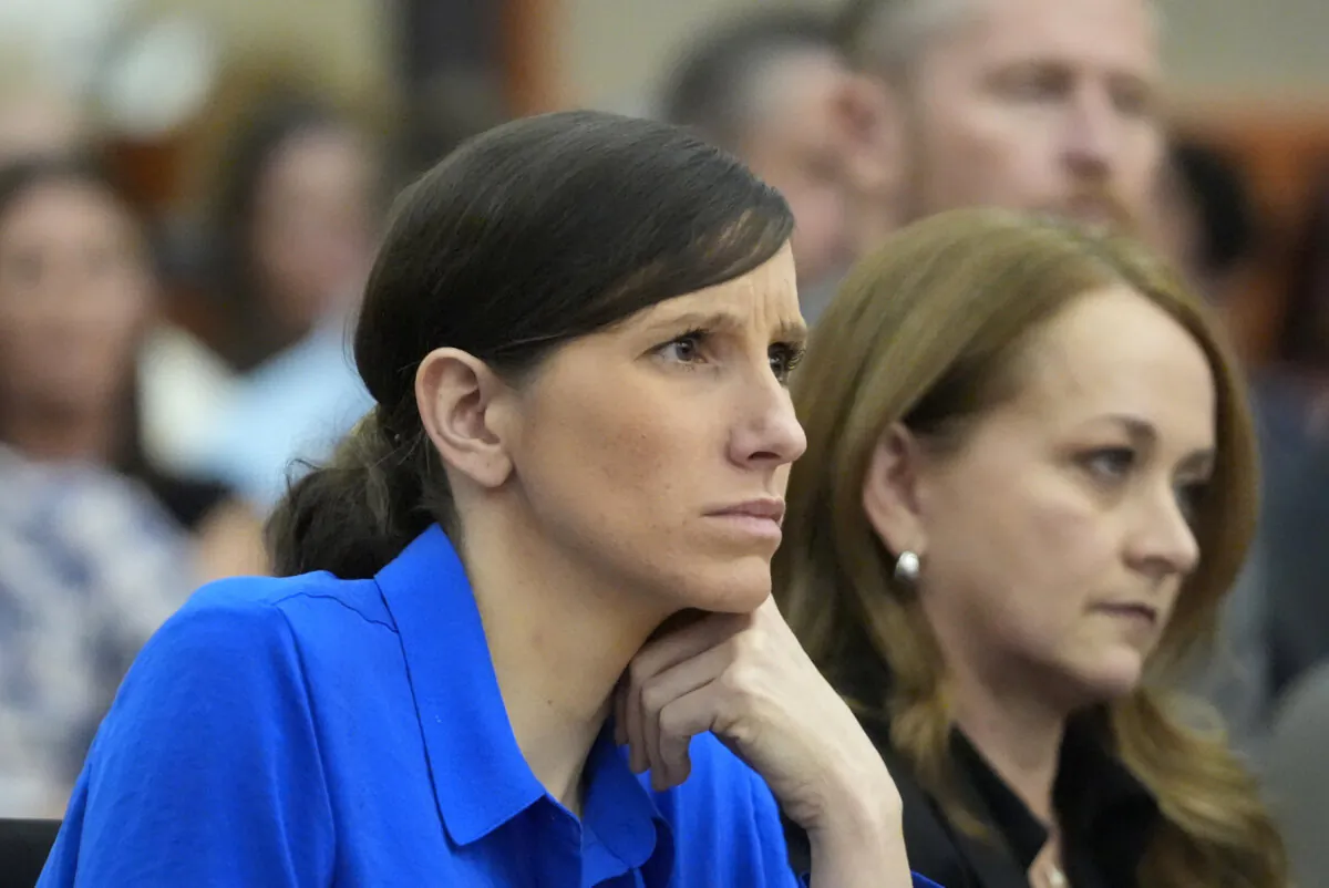 Kouri Richins, a Utah mother of three who wrote a children's book about coping with grief after her husband's death and was later accused of fatally poisoning him, looks on during a court hearing in Park City, Utah, on Aug. 27, 2024. (Rick Bowmer/Pool via AP Photo)
