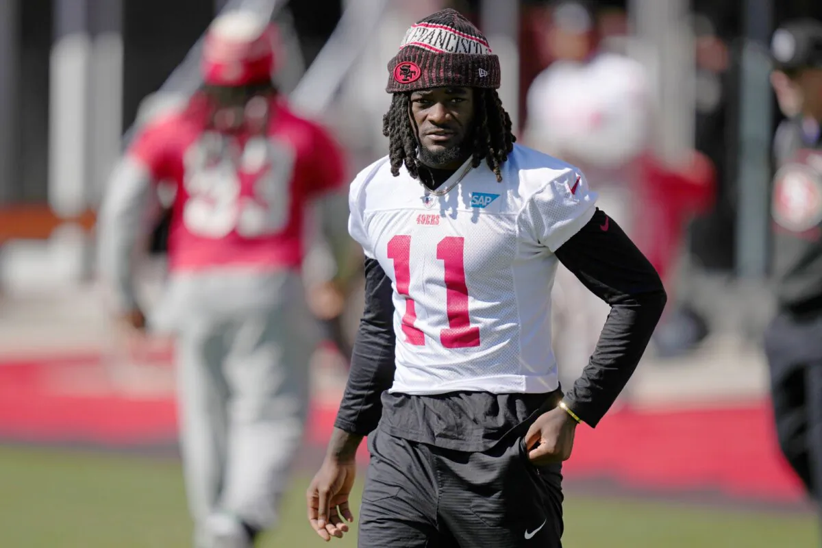 San Francisco 49ers wide receiver Brandon Aiyuk warms up before practice during Super Bowl week in Las Vegas on Feb. 10, 2024. (John Locher/AP Photo)