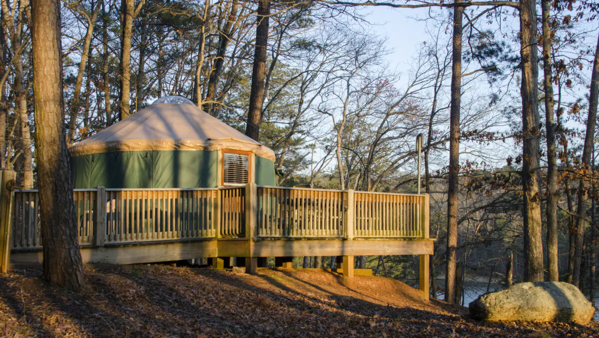 Tent camping in a yurt, at Red Top Mountain State Park in Cartersville, Ga. Made of wood and canvas, yurts feature a deck, picnic table and grill/fire ring outside. (William Wise/Dreamstime/TNS)