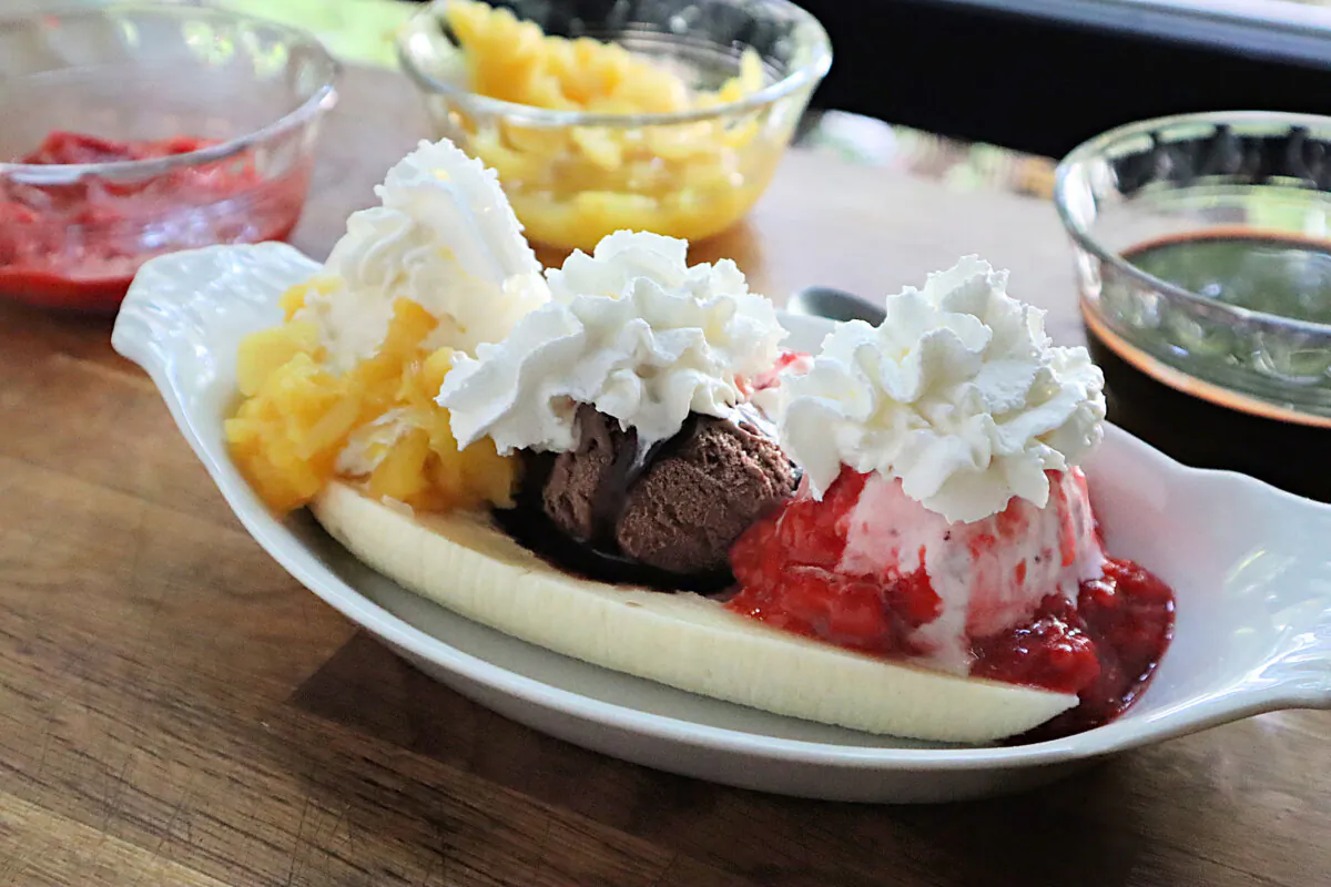 A traditional banana split is made with chocolate, vanilla, and strawberry ice creams and topped with pineapple, strawberries, and chocolate sauces. (Gretchen McKay/Pittsburgh Post-Gazette/TNS)