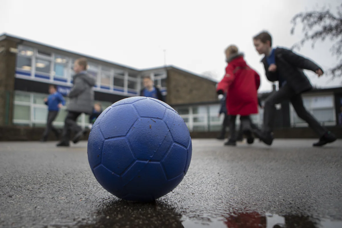 School children playing during a break at a primary school in Yorkshire, England, on Nov. 27, 2019. (Danny Lawson/PA Wire)