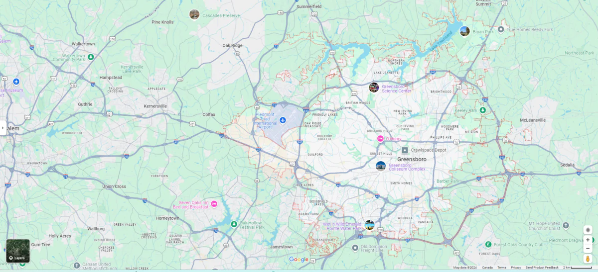  A small plane that had made an emergency landing on a highway near a North Carolina airport was hit by a vehicle, injuring one of the aircraft's occupants, authorities said. (Screenshot via Google Map)