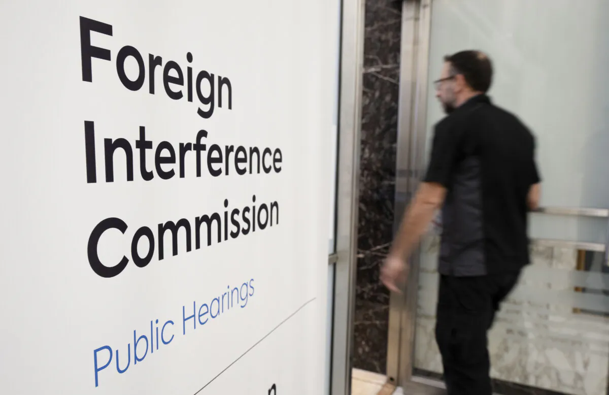 A person enters the Foreign Interference Commission in Ottawa on Jan. 29, 2024. (The Canadian Press/Adrian Wyld)