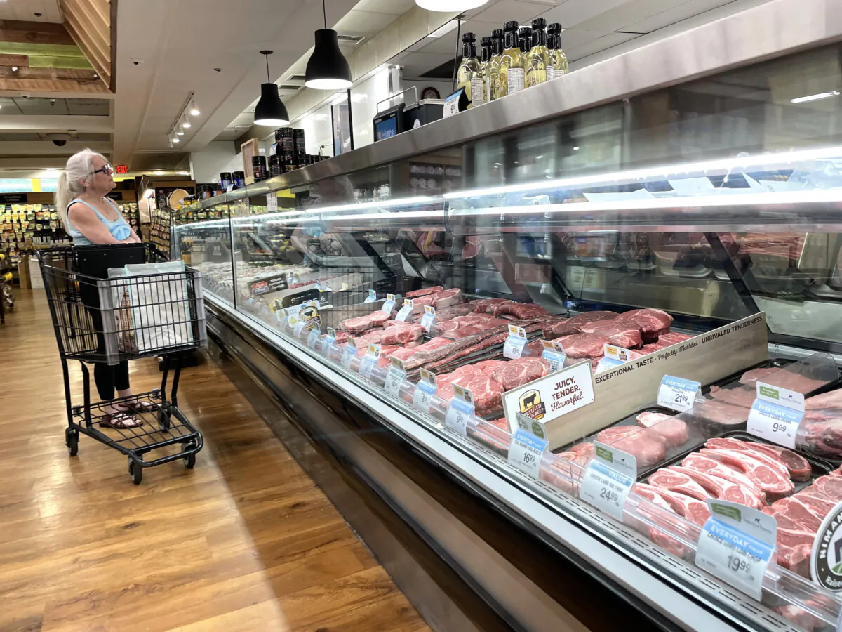 A customer shops for meat at an Andronico's supermarket in San Anselmo, Calif., on June 8, 2022. (Justin Sullivan/Getty Images)