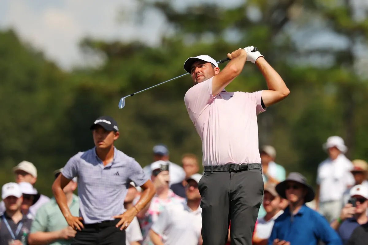 Scottie Scheffler of the United States hits his shot from the ninth tee during the second round of the TOUR Championship in Atlanta on Aug. 30, 2024. (Kevin C. Cox/Getty Images)