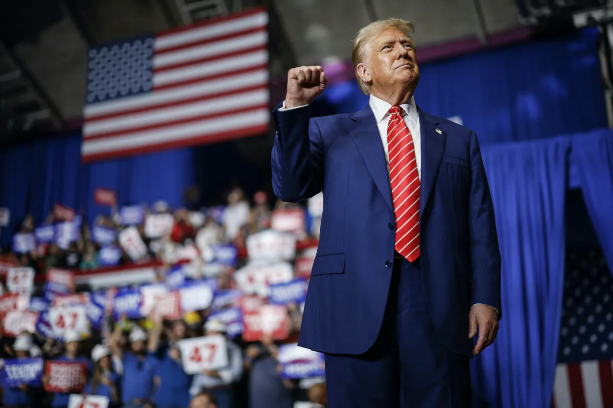 Republican presidential nominee, former President Donald Trump takes the stage during a campaign rally in the 1st Summit Arena at the Cambria County War Memorial in Johnstown, Pa., on Aug. 30, 2024. (Chip Somodevilla/Getty Images)