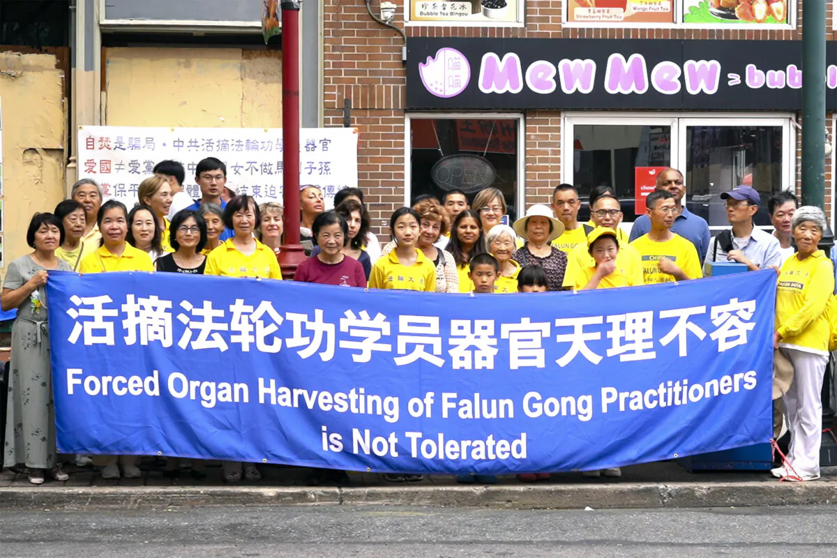 A rally condemning forced organ harvesting in China is held in Philadelphia's Chinatown on Aug. 31, 2024. (William Huang/The Epoch Times)