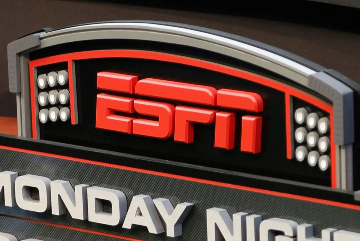 The ESPN logo is seen prior to an NFL football between the Cincinnati Bengals and Pittsburgh Steelers in Cincinnati on Sept. 16, 2013. (David Kohl/AP Photo)