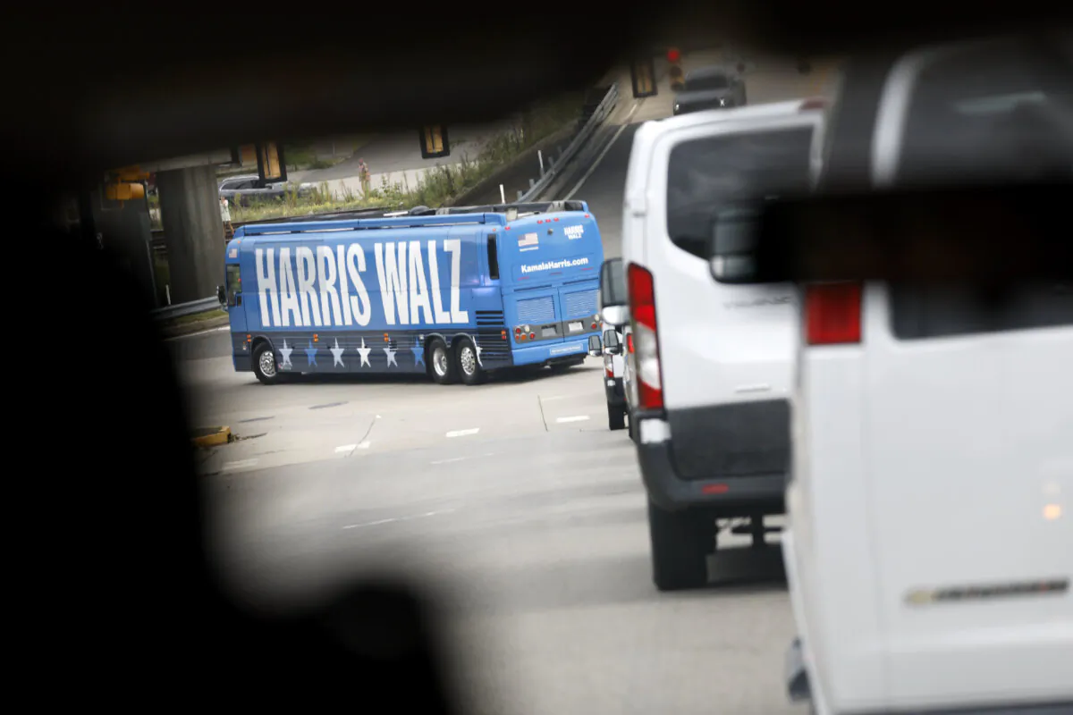 A campaign bus for Democratic presidential nominee Vice President Kamala Harris and Democratic vice presidential nominee Minnesota Gov. Tim Walz drives in a motorcade in Rochester, Pa., on Aug. 18, 2024. (Anna Moneymaker/Getty Images)