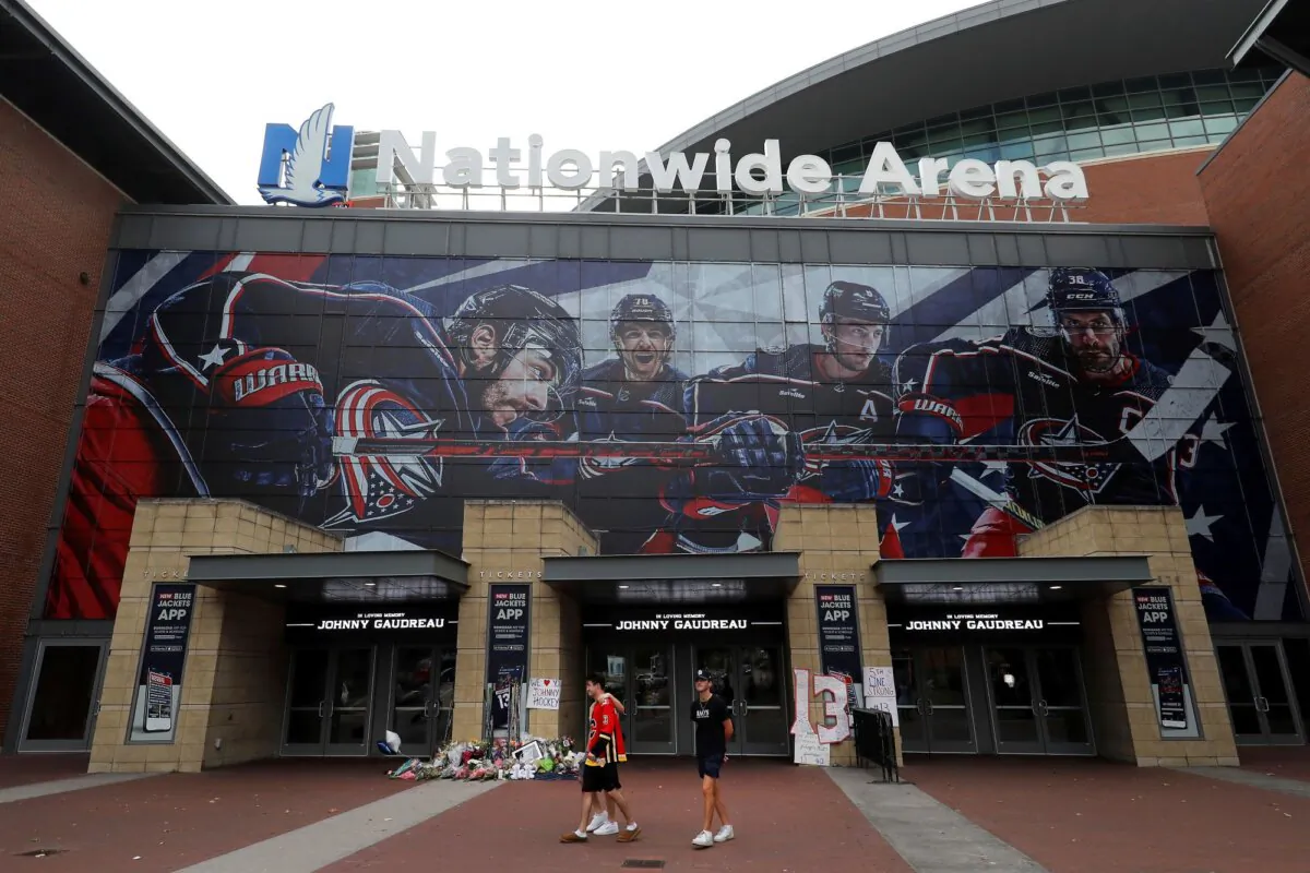 A memorial for Columbus Blue Jackets player Johnny Gaudreau and his brother, Matthew, outside Nationwide Arena in Columbus, Ohio, on Aug. 30, 2024. (Joe Maiorana/AP Photo)