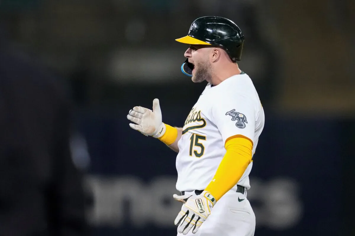 Seth Brown of the Oakland A's celebrates his walk-off single against the Seattle Mariners in Oakland, Calif., on Sept. 3, 2024. (Godofredo A. Vásquez/AP Photo)