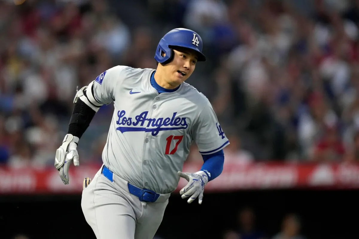 Los Angeles Dodgers star Shohei Ohtani heads to first base after hitting an RBI triple against the Los Angeles Angels in Anaheim, Calif., on Sept. 3, 2024. (Mark J. Terrill/AP Photo)