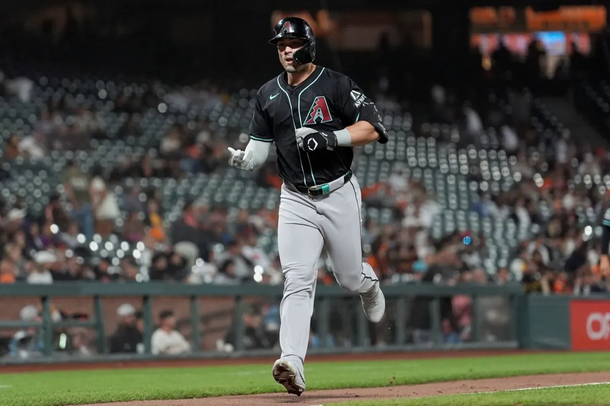 Randal Grichuk of the Arizona Diamondbacks trots home after hitting his second home run of the game against the San Francisco Giants in San Francisco on Sept. 3, 2024. (Jeff Chiu/AP Photo)
