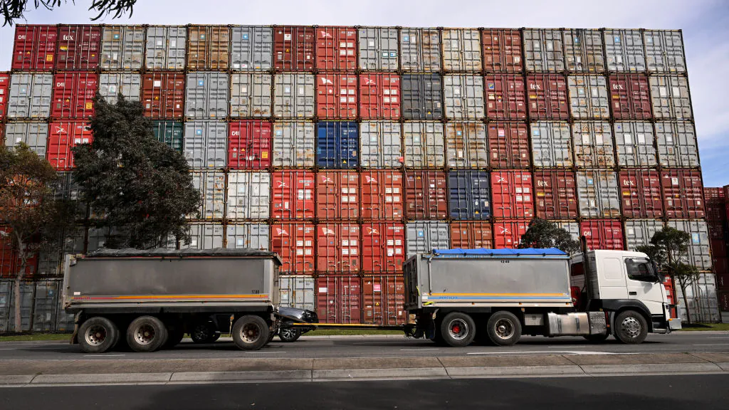 A truck drives past the container terminal at the Port of Melbourne in Melbourne, Australia on Sept. 4, 2024. (William West/AFP via Getty Images)