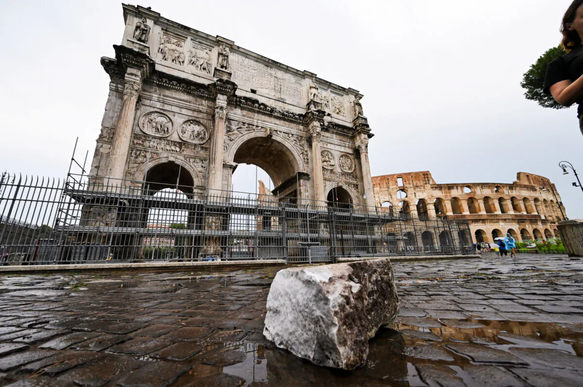 Fragments of Constantine's Arch lie on the ground after lightning struck it during a storm in Rome on Sept. 3, 2024. (Alberto Lingria/Reuters）