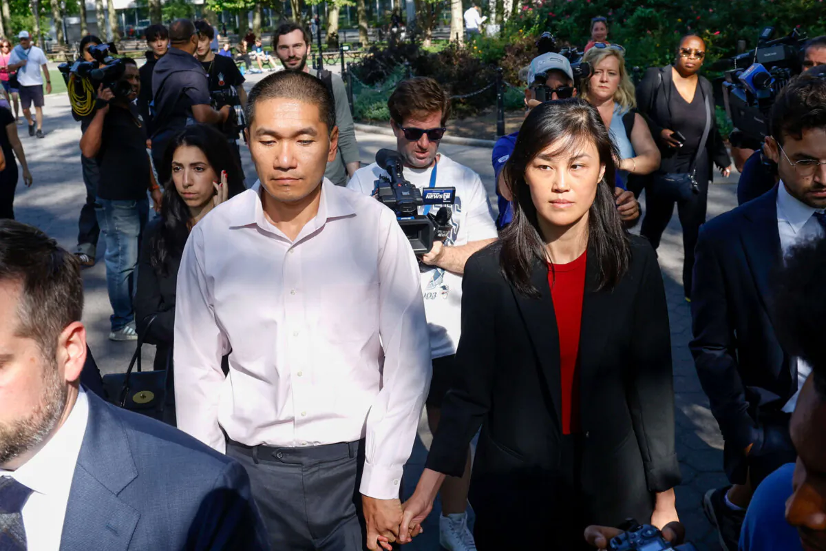 New York Gov. Kathy Hochul's former aide, Linda Sun (R), and her husband, Christopher Hu, leave Brooklyn Federal Court after their arraignment in New York City on Sept. 3, 2024. (Corey Sipkin/AP Photo)
