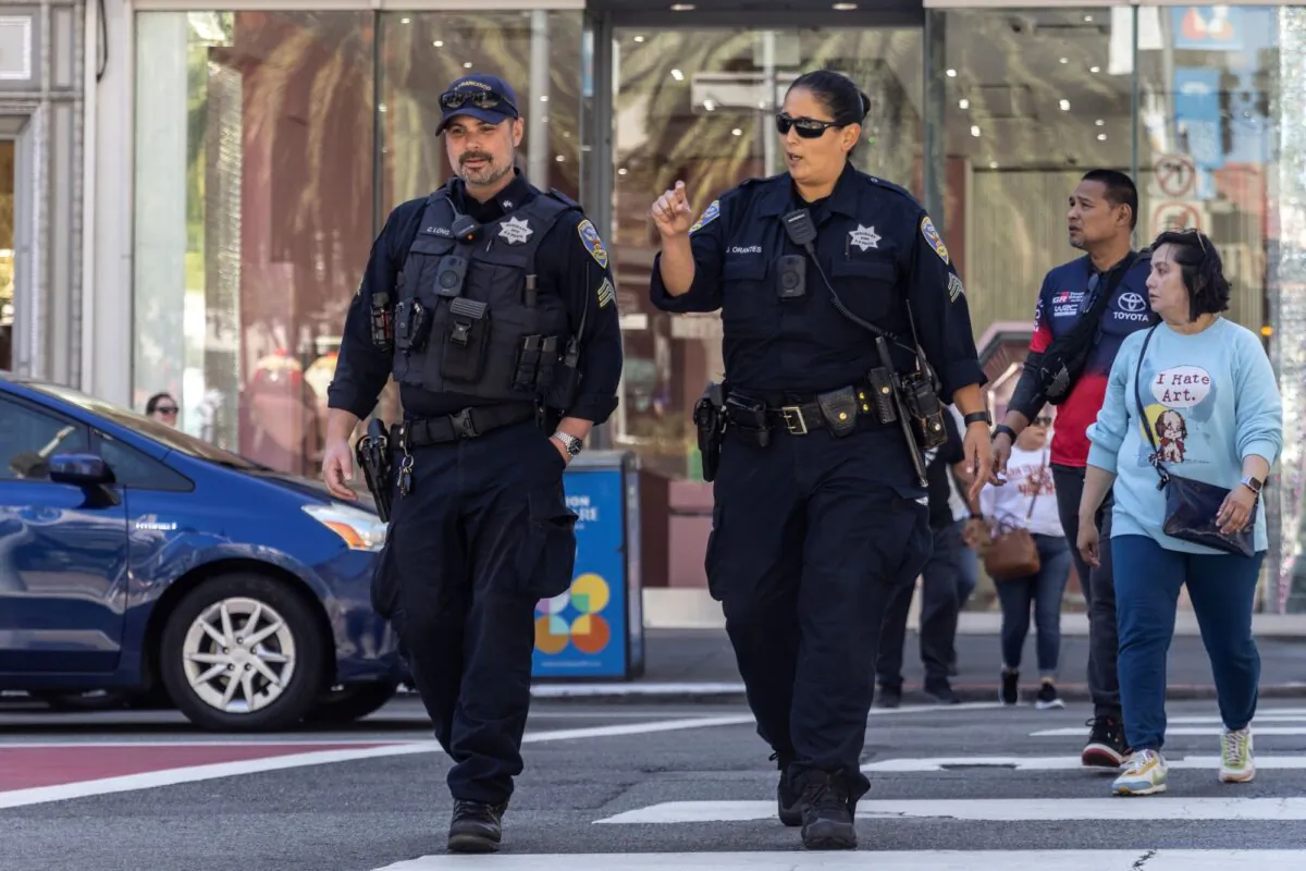 San Francisco Police Department officers patrol Union Square in San Francisco on Sept. 1, 2024. (Stephen Lam/San Francisco Chronicle via AP)