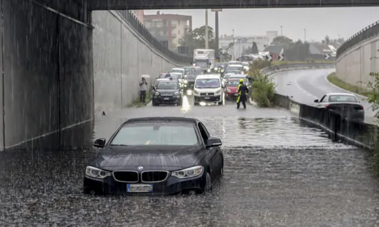 Torrential Rains in Northern Italy Flood Milan and Leave a Man Missing