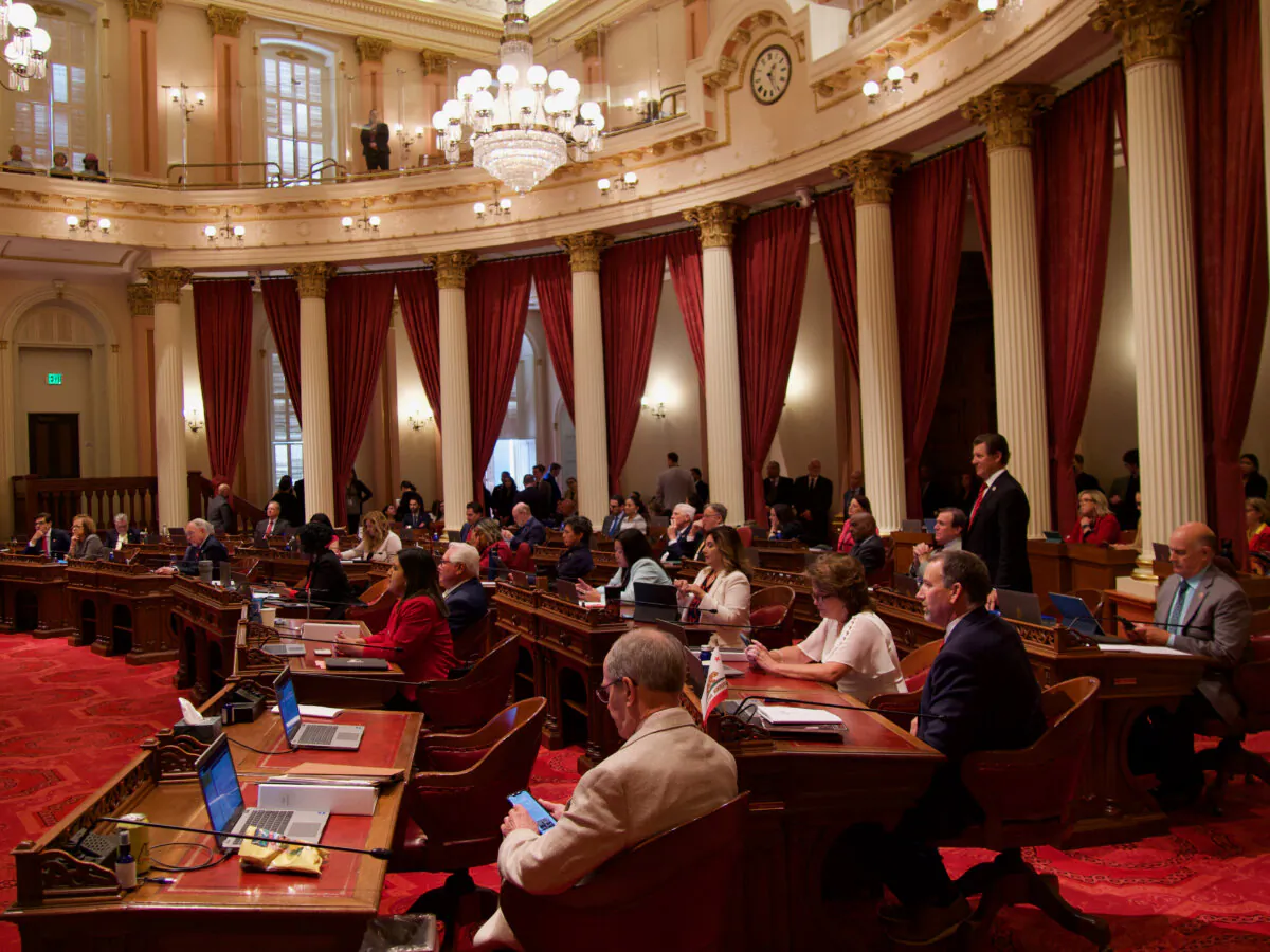 California state senators gather on the last day of the 2023 to 2024 legislative session at the Capitol in Sacramento on Aug. 31, 2024. (Travis Gillmore/The Epoch Times)